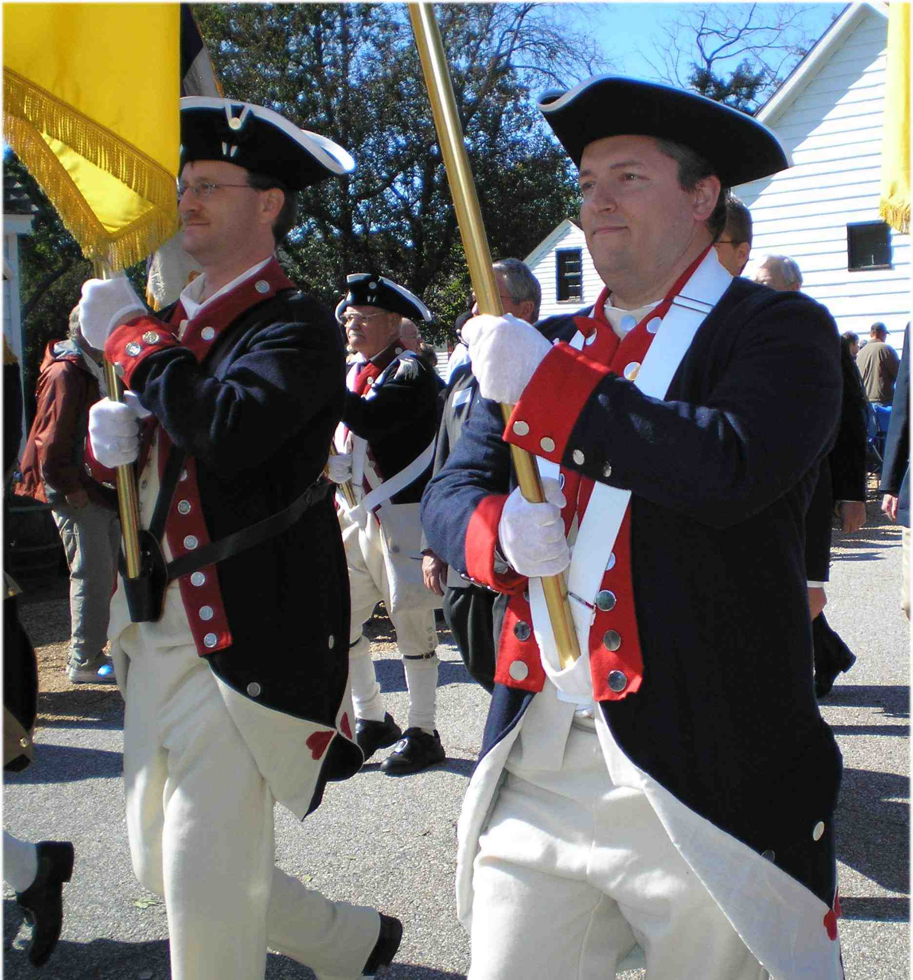 Darrin Schmidt and Dan Rolph marching in Continental Line uniforms.