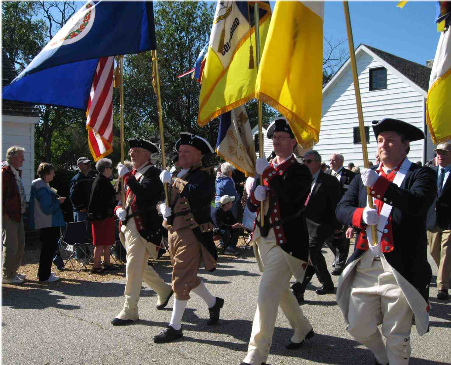 Fairfax Resolves members march with the Virginia Color Guard in the Yorktown parade.