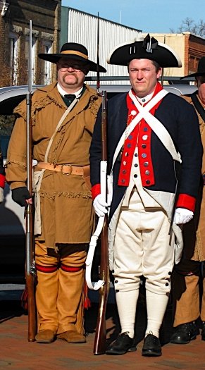 Dan Rolph in a Continental Line uniform and another gaurdsman in Frontier uniform. Both carry a reproduction Brown Bess flintlock musket.