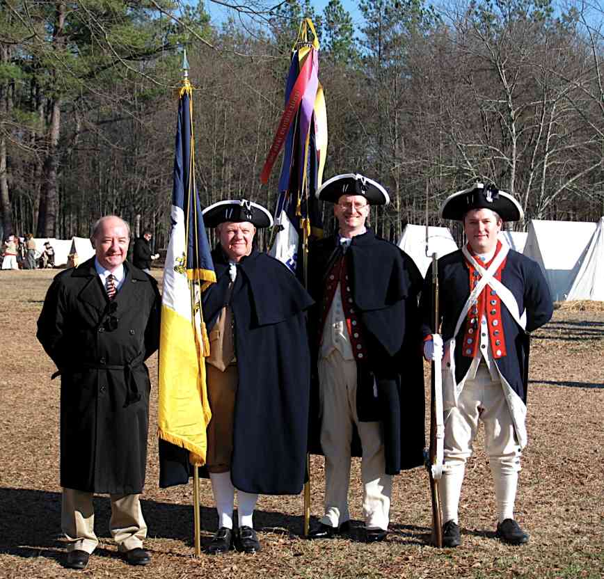 Fairfax Resolves Members participating at Cowpens: Phil Ray, Larry McKinley, Darrin Schmidt, and Dan Rolph. The tents and demonstrations of the reenactors can be seen in the background.