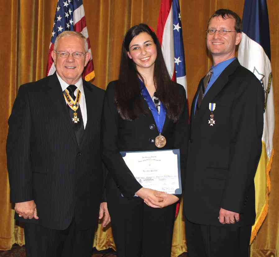 The first Virginia winner of the National Orations contest since 1978 stands with Compatriots Larry McKinley (left) and Darrin Schmidt of the sponsoring Fairfax Resolves Chapter.