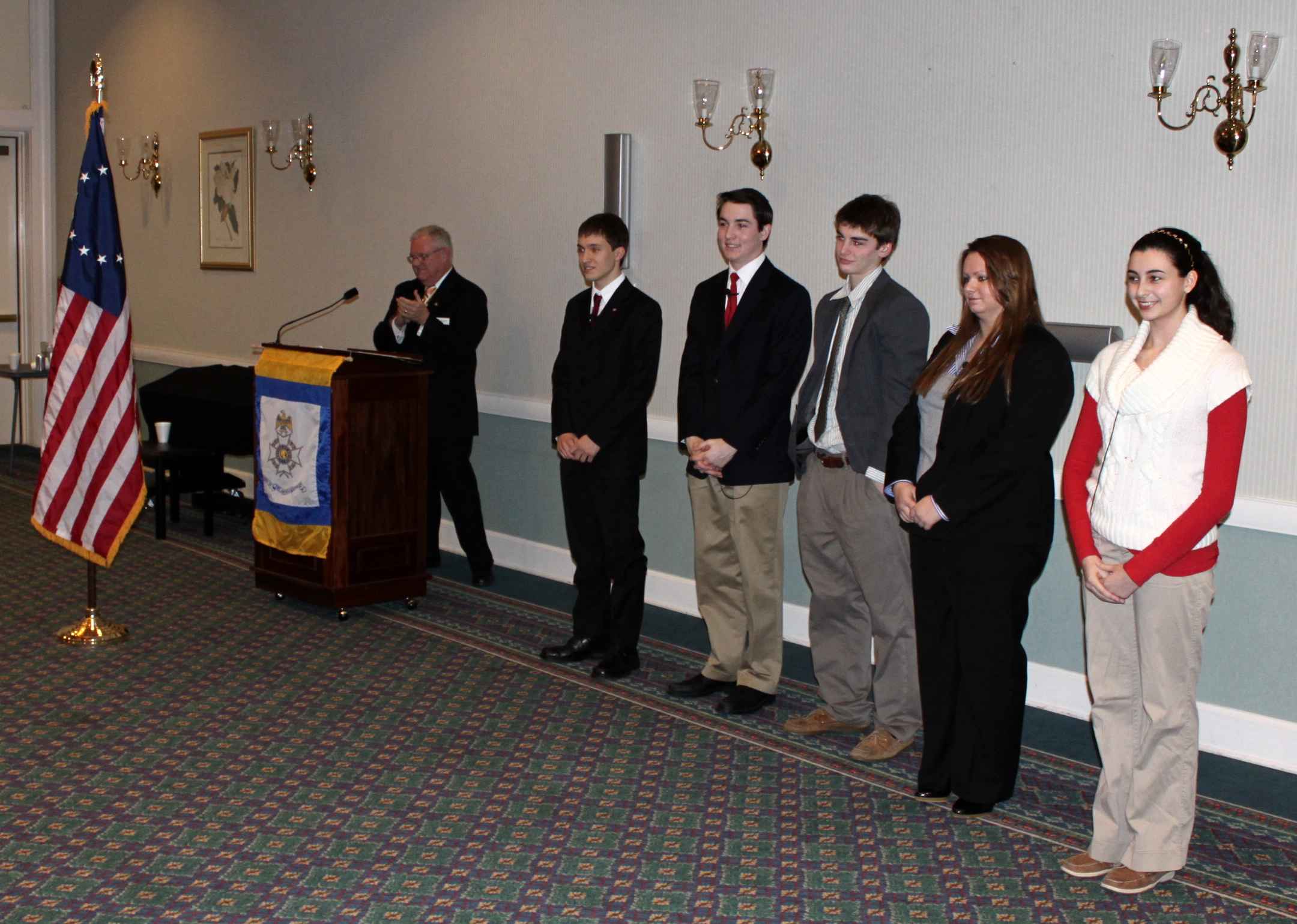 All of the contestants of the contest prepare to introduce themselves to the crowd after the completion of the orations.