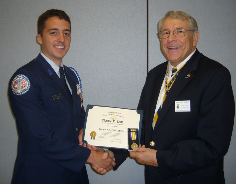 Compatriot Jack Sweeney presents the SAR JROTC Medal to Cadet Charles Keith at Chantilly High School on 14 May, 2011.