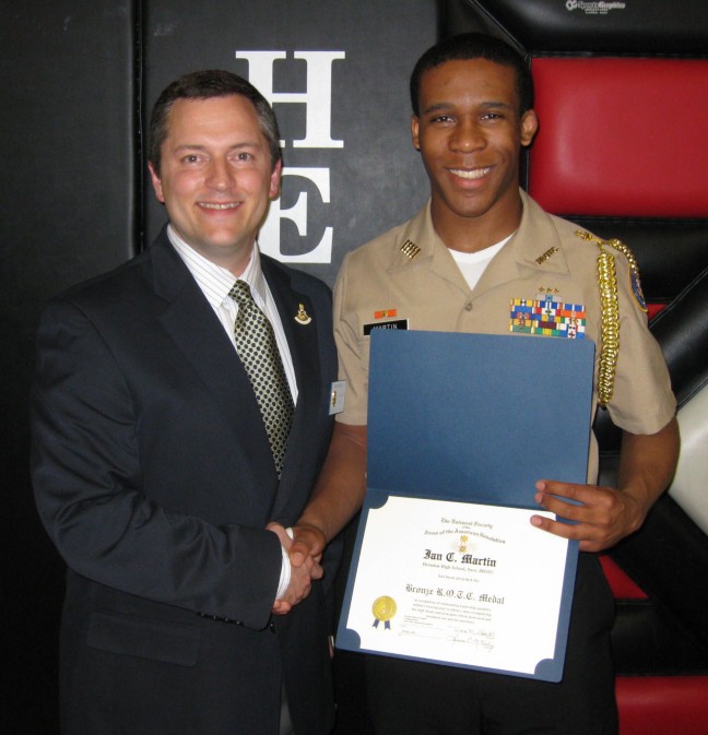 Compatriot Dan Rolph presents the SAR JROTC Medal to Cadet Ian Martin at Herndon High School on 20 May, 2011.