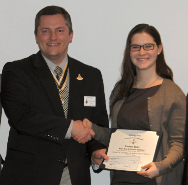 Chapter President Dan Rolph present Ms. Baxter with the award for her winning essay