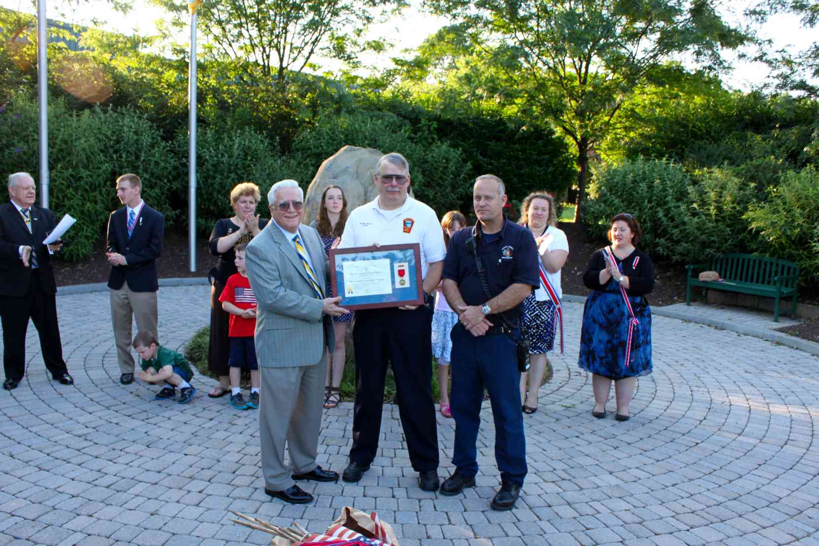 Vernon Eubanks presents a Fire Safety Commendatino Award to Chief Frank Smith of the Great Falls Volunteer Fire Department