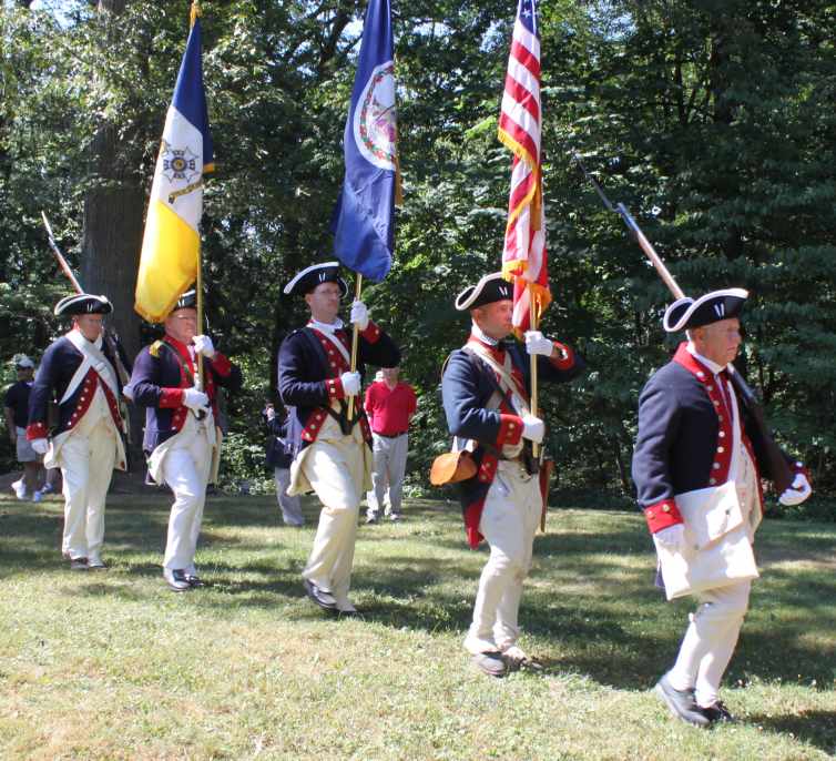Colorguard Guardsmen (right to left) Vernon Eubanks, Brett Osborn, Darrin Schmidt, Larry McKinley, and Don Jennings marching at the July 4th observance at Mt. Vernon.