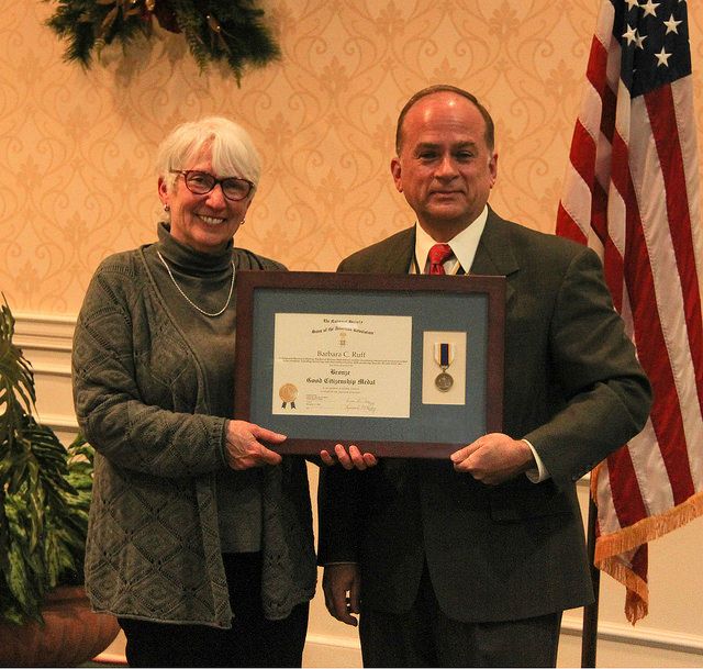 In the attached photo, Fairfax Resolves Chapter President, Bill Price, presents Ms. Ruff with a professionaly framed Bronze Citizenship Medal Certificate and mounted medal.
