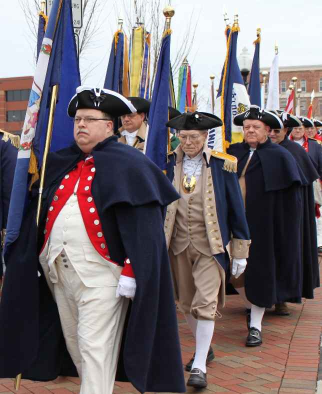 Allen Brahin (left) carries the Virginia Blue while Virginia Color Guard Commander Larry McKinley (right side) carries the Virginia Color Guard flag.