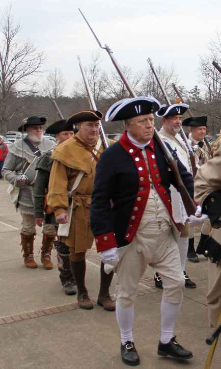 Vern Eubanks marches into the ceremony at the Cowpens Battlefield carrying his Brown Bess musket.