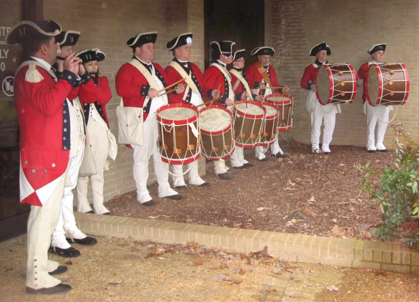 The Fife and Drum Corps practices before the ceremony.