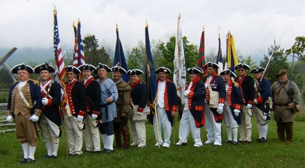 Joint VASSAR and Kentucky Color Guard poised outside the Fort