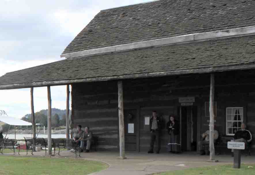 The log cabin overlooking the Ohio and Kanawha rivers is the home of the Mansion House Museum