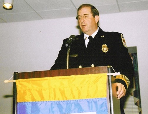 Fire Chief Ronald Mastin bringing greetings to those gathered at Vinson Hall