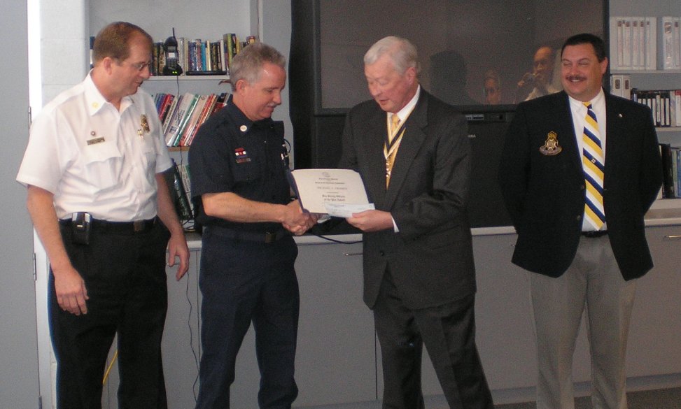 Chief Mastin, Michael Frames, Chapter President Tom Speelman, and Chairman Andrew Monahan