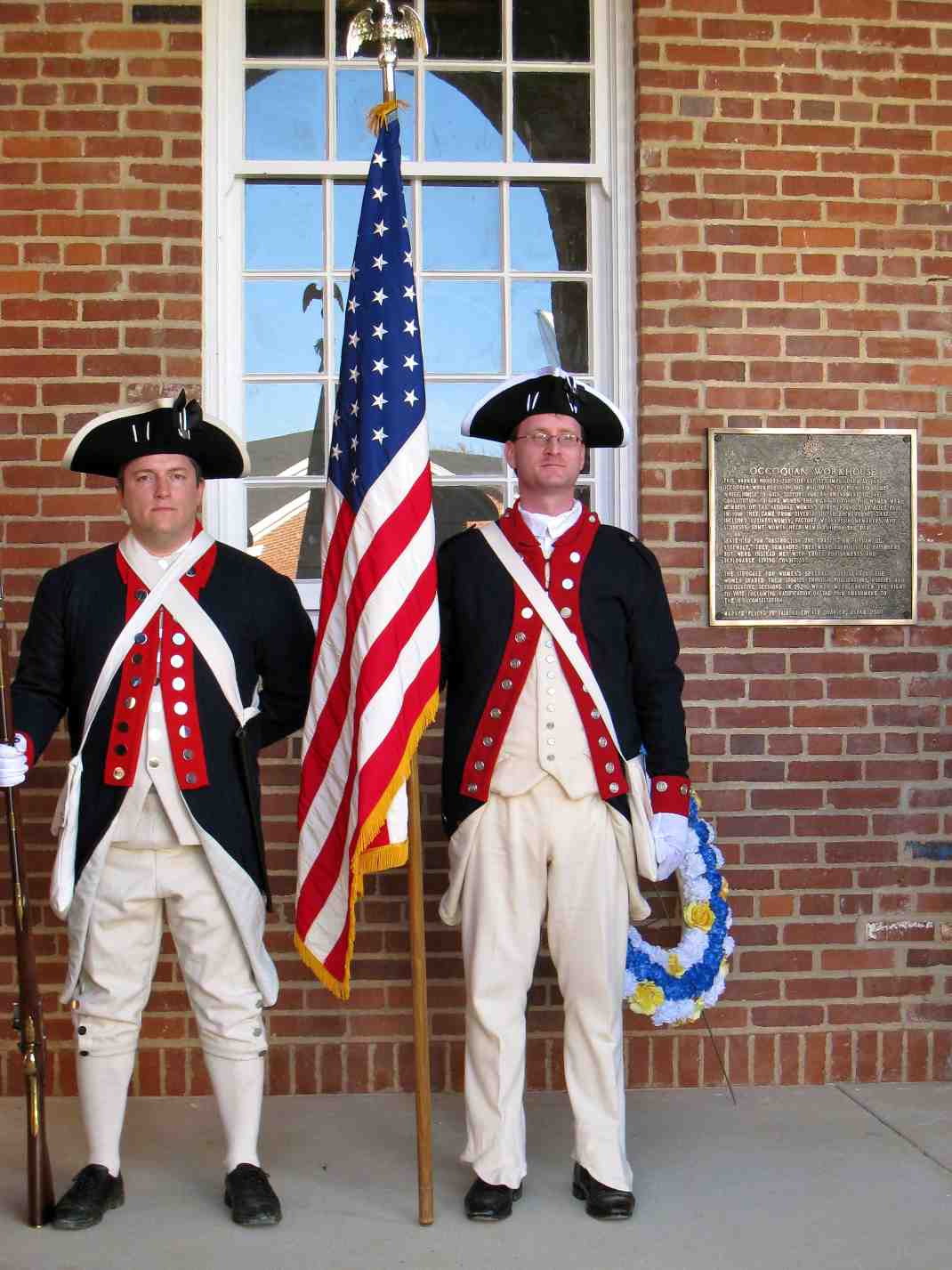 Dan Rolph (left) and Darrin Schmidt stand next to the newly installed historical marker.