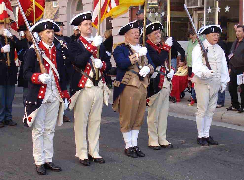 Members of the Fairfax Resolves march with the VASSAR Color Guard in the Manassas Veterans Day Parade.<br />From left to right: Peter Davenport, Darrin Schmidt, Color Guard Commander Larry McKinley, Andy Johnson, and Vernon Eubanks.