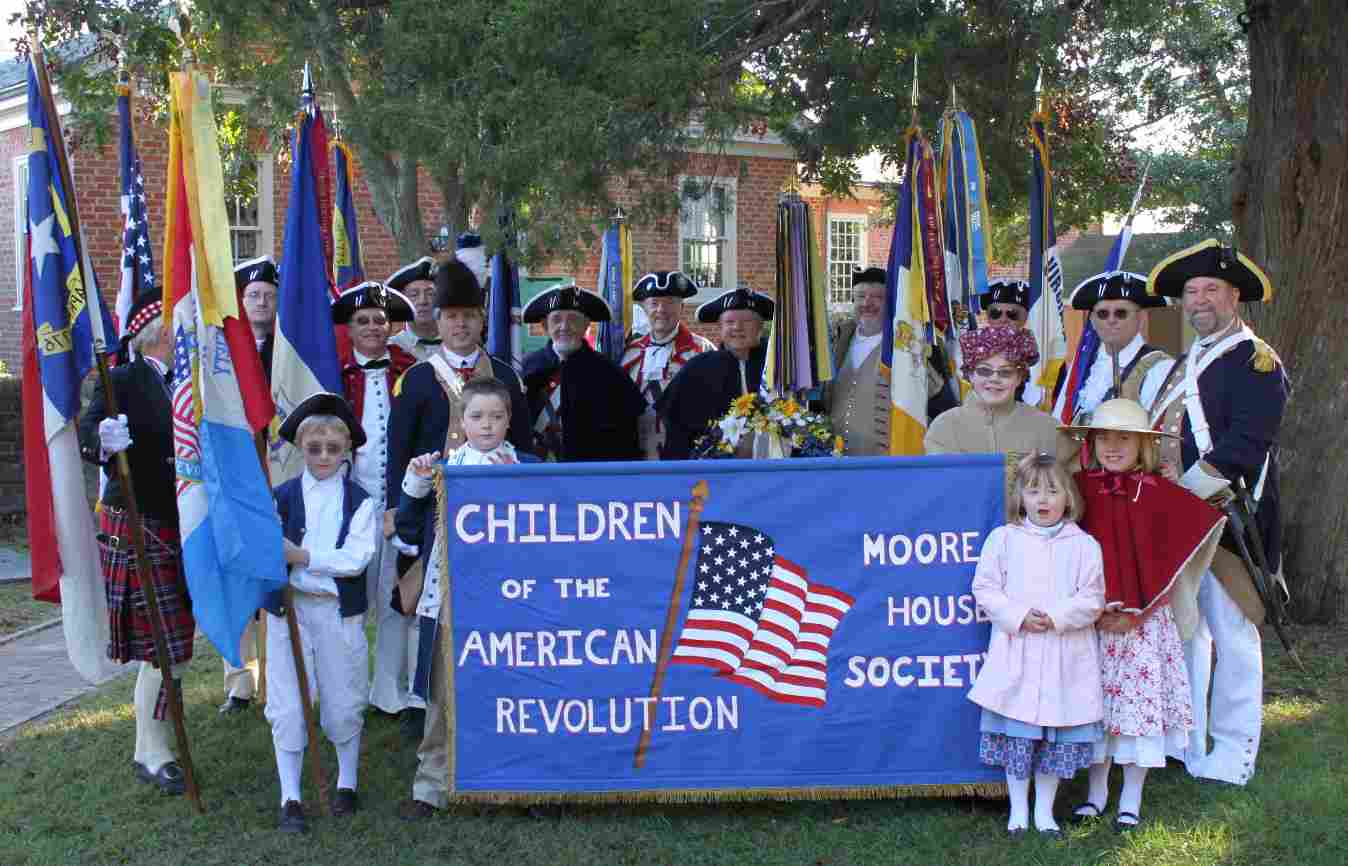 SAR and C.A.R. members with C.A.R. banner