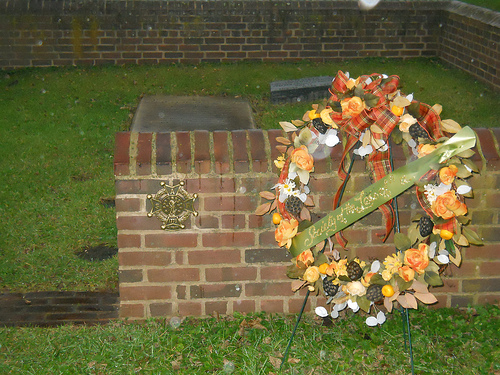 The SAR Marker is mounted on the brick wall just that surrounds the cemetery plots at Sully Plantation in Fairfax, Virginia.